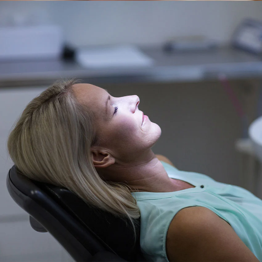 Stress-free and relaxed patient getting dental treatment in Cameron Park, cA