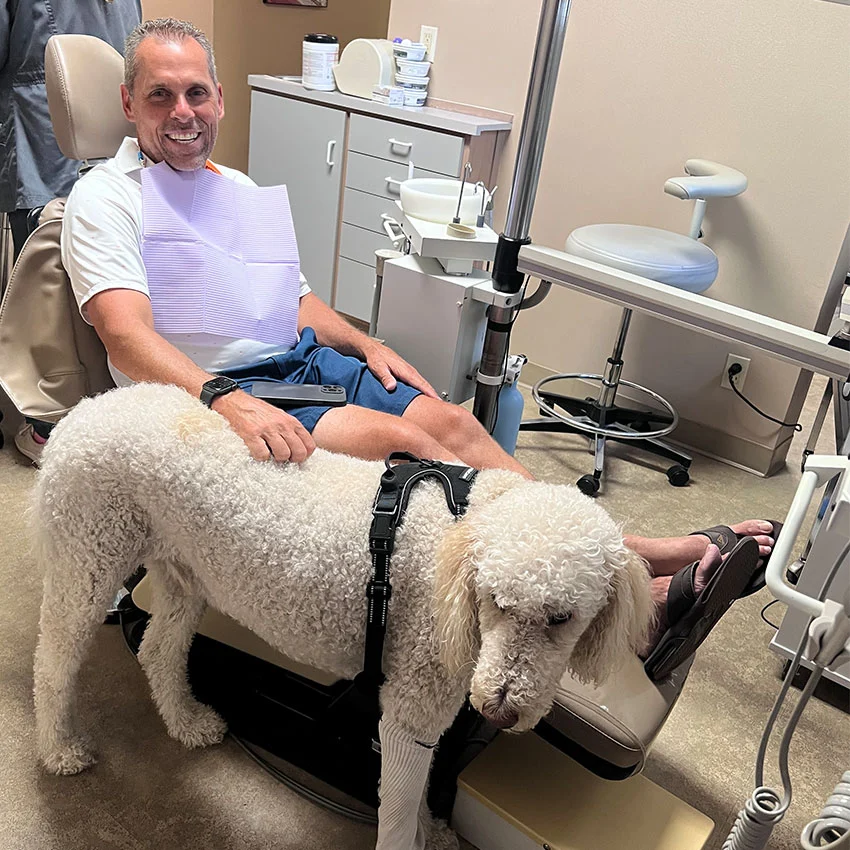 Mochi and patient at Cameron Park Family Dentistry